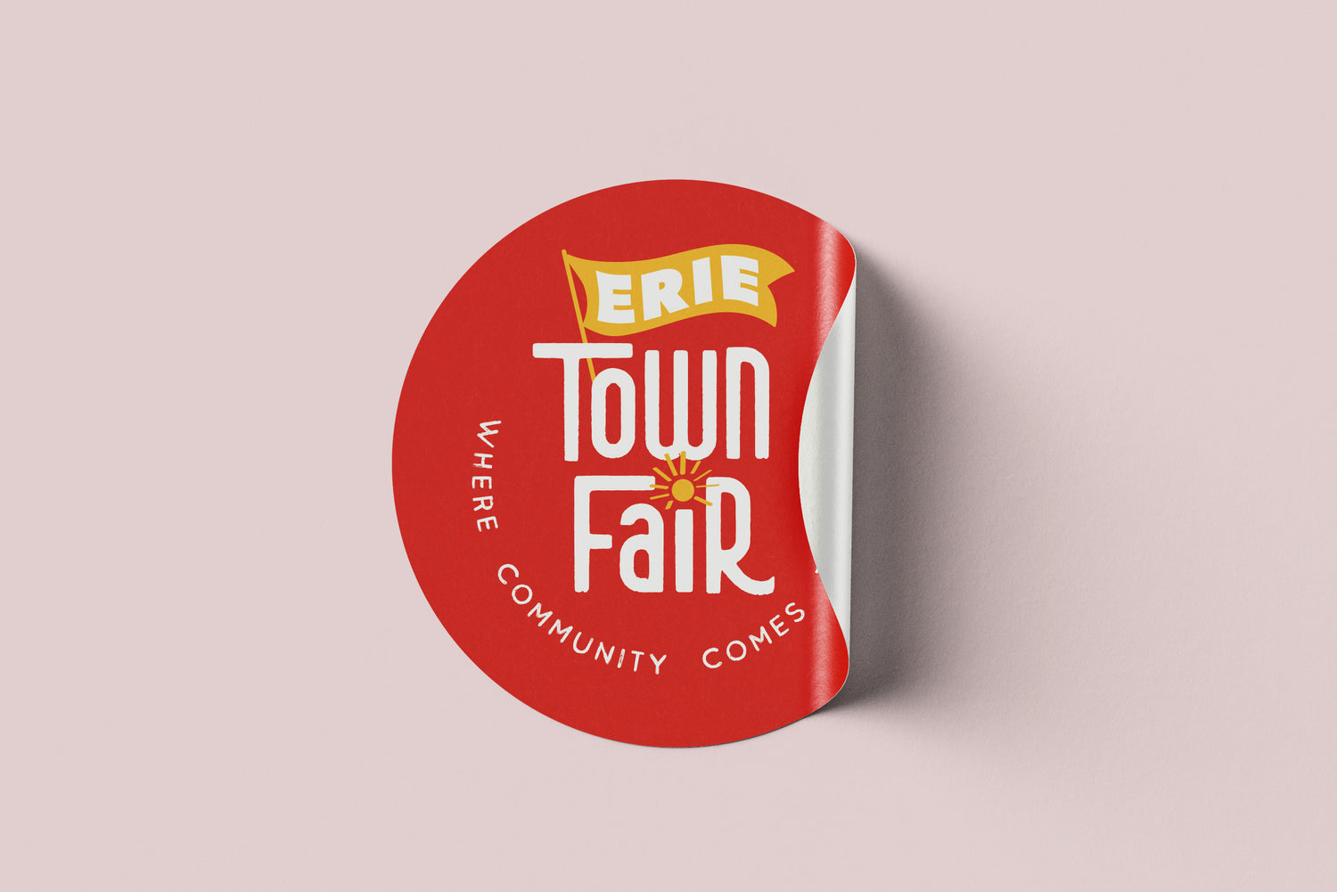 Red sticker with 'Erie Town Fair' logo on a beige background designed by O Hey Amy Design Studio